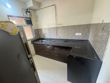 Kitchen in 1 BHK Apartment at Raunak Bliss, Ghodbunder Road – for Rent
