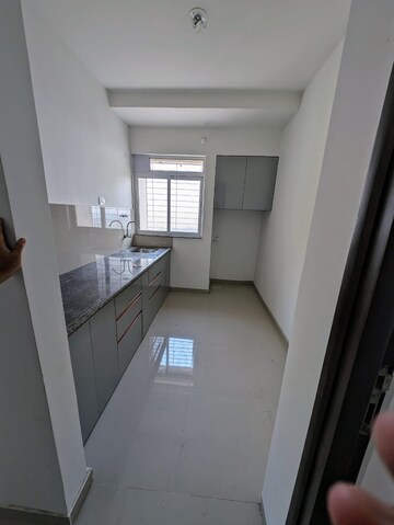 Kitchen in 1 BHK Apartment at Raunak Delight, Owale – for Rent