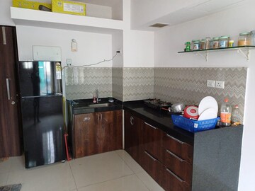 Kitchen in 1 BHK Apartment at Raunak Delight, Owale – for Rent