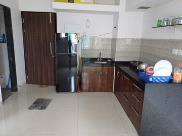 Kitchen in 1 BHK Apartment at Raunak Delight, Owale – for Rent