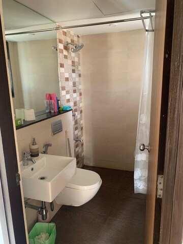 Bathroom in 1 BHK Apartment at Raunak Delight, Owale – for Rent