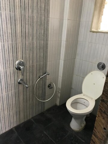 Bathroom in 1 BHK Apartment at Raunak Delight, Owale – for Rent