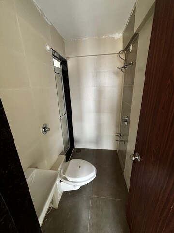 Bathroom in 1 BHK Apartment at Raunak Delight, Owale – for Rent