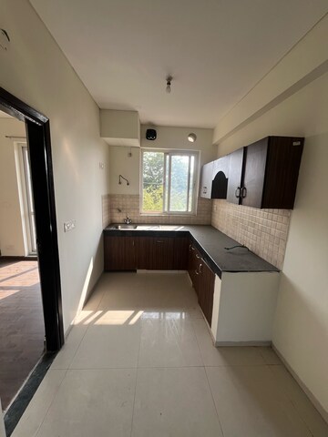 Kitchen in 3 BHK Builder Floor at BPTP Parkland Pride, Sector 77 – for Sale