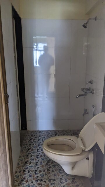 Bathroom in 1 BHK Apartment at Vihang Valley Phase 2, Kasarvadavali – for Sale