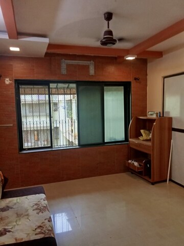 Living Room in 1 BHK Apartment at Sagar Sangeet CHS, Borivali West – for Rent