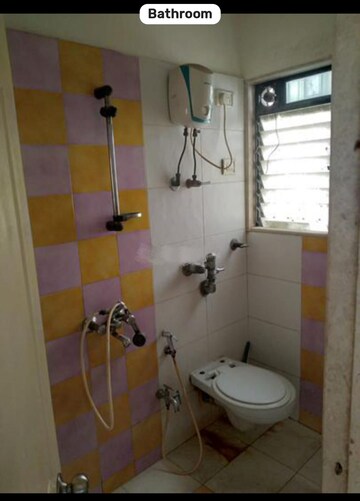 Bathroom in 1 BHK Apartment at Galaxy Classique, Goregaon West – for Rent