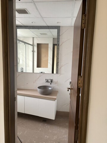 Kitchen in 5 BHK Apartment at Mahagun Manorial, Sector 128 – for Sale