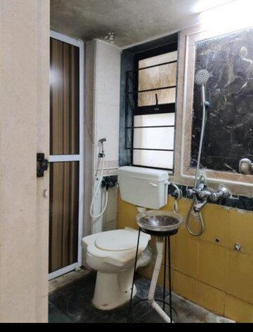 Bathroom in 1 BHK Apartment at Sheth Vasant Galaxy, Goregaon West – for Rent