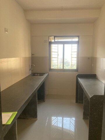 Kitchen in 2 BHK Apartment at ACME Gingelia Residential, Kolshet – for Sale