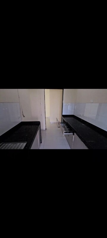 Kitchen in 2 BHK Apartment at Rustomjee Azziano Wing D, Majiwada – for Sale