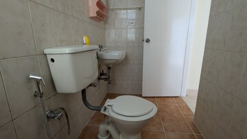 Bathroom in 3 BHK Apartment at Vaswani Golf Vista Tulip, Domlur – for Rent