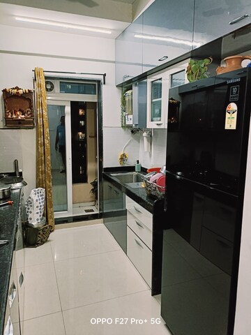 Kitchen in 2 BHK Apartment at Rustomjee Urbania, Majiwada – for Sale