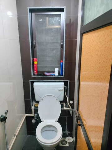 Bathroom in 1 BHK Apartment at Surya Enclave Co op hsg Society, Manpada – for Sale