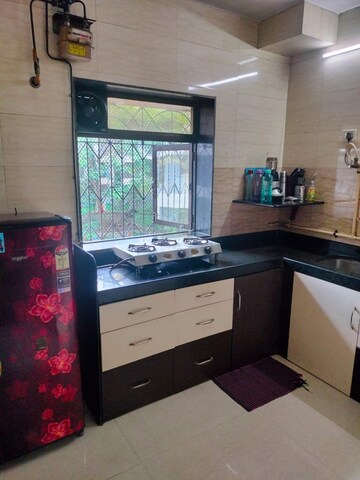 Kitchen in 1 BHK Apartment at Surya Enclave Co op hsg Society, Manpada – for Sale