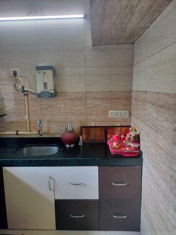 Kitchen in 1 BHK Apartment at Surya Enclave Co op hsg Society, Manpada – for Sale
