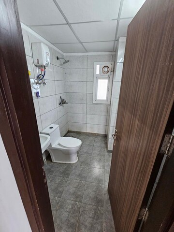 Bathroom in 3 BHK Apartment at Gulshan Botnia, Sector 144 – for Sale
