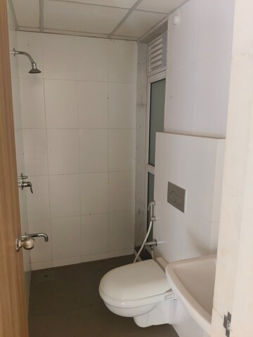 Bathroom in 1.5 BHK Apartment at Godrej Emerald, Ghodbunder Road – for Rent