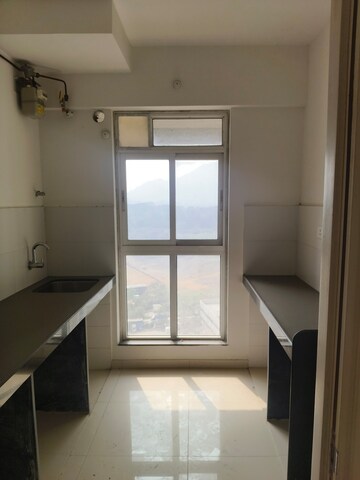 Kitchen in 1.5 BHK Apartment at Godrej Emerald, Ghodbunder Road – for Rent