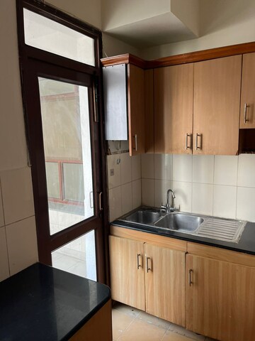 Kitchen in 3.5 BHK Apartment at Vipul Greens, Sector 48 – for Sale
