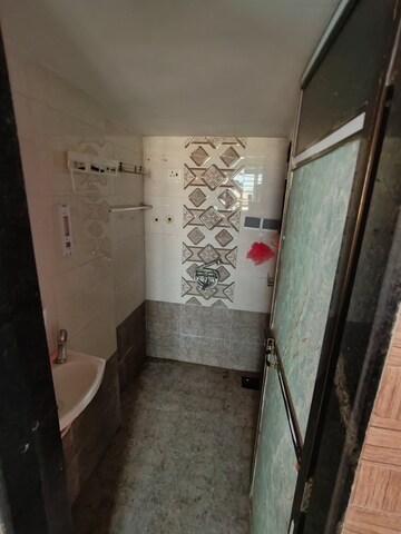 Bathroom in 1 BHK Apartment at Saurabh Crystal Pallazo, Nalasopara West – for Rent