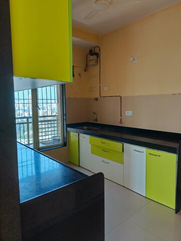 Kitchen in 2.5 BHK Apartment at Rustomjee OZone, Goregaon West – for Rent