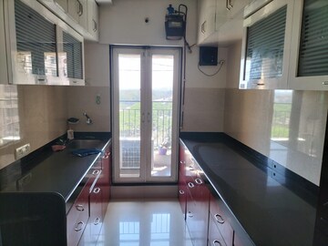 Kitchen in 2 BHK Apartment at Rustomjee Urbania Atelier, Majiwada – for Rent