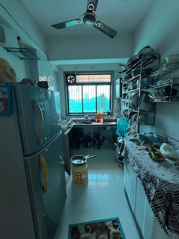 Kitchen in 1 BHK Apartment at Krishna Enclave CHS, Kalyan East – for Sale