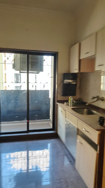 Kitchen in 3.5 BHK Apartment at Windermere CHS Andheri West, Andheri West – for Sale