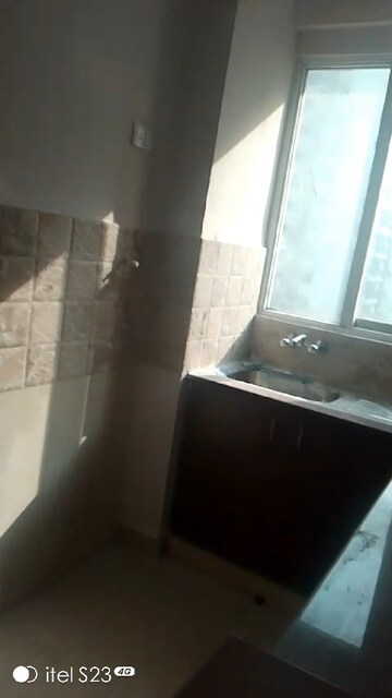 Kitchen in 2.5 BHK Apartment at Amrapali Golf Homes, Sector 4, Greater Noida – for Rent