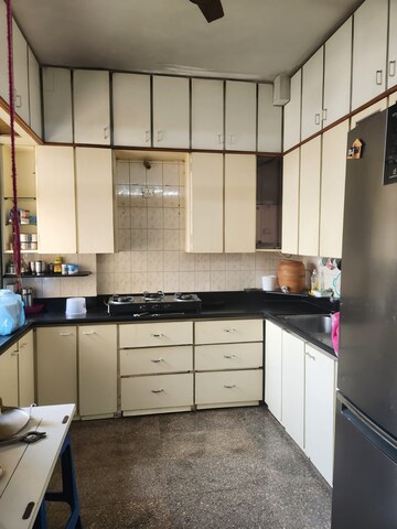 Kitchen in 2 BHK Apartment at Indradarshan II, Oshiwara – for Rent
