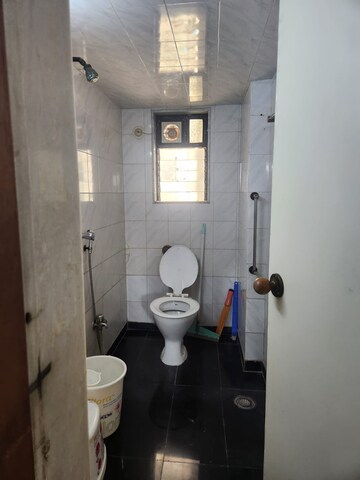 Bathroom in 2 BHK Apartment at Indradarshan II, Oshiwara – for Rent