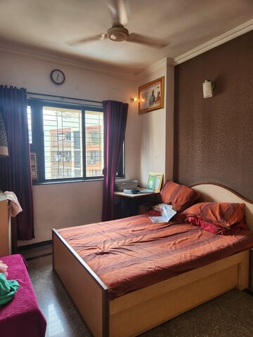 Bedroom in 2 BHK Apartment at Indradarshan II, Oshiwara – for Rent