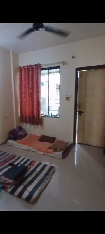 Bedroom in 2 BHK Apartment at RK Lunkad Nisarg Raj, Thergaon – for Rent