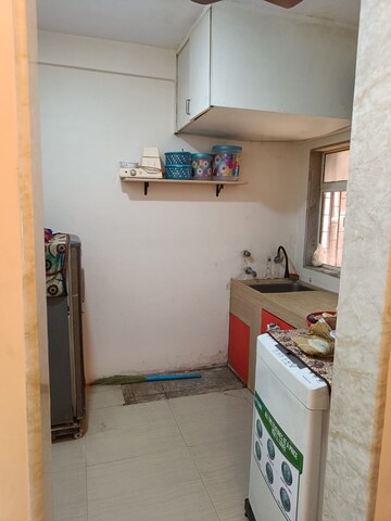 Kitchen in 2 BHK Apartment at Shantinagar CHS, Mira Road – for Rent
