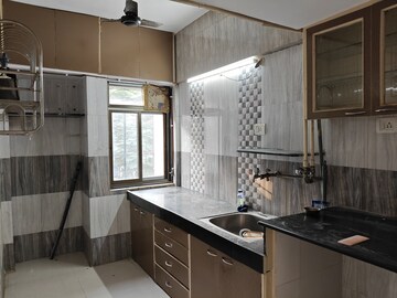 Kitchen in 3 BHK Apartment at Siddhanchal CHS, Pawar Nagar – for Rent