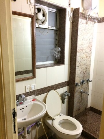 Bathroom in 1 BHK Apartment at Siddhachal Phase 5 CHS Ltd, Vasant Vihar – for Sale