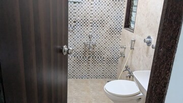 Bathroom in 3 BHK Apartment at Asmita Sand Dunes, Malad West – for Rent