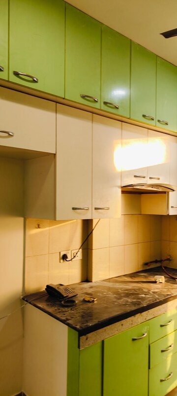 Kitchen in 3 BHK Apartment at Dhoot Time Residency, Sector 63 – for Rent