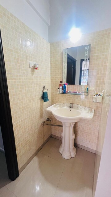 Bathroom in 2 BHK Apartment at Chaurang CHS, Sanpada – for Rent