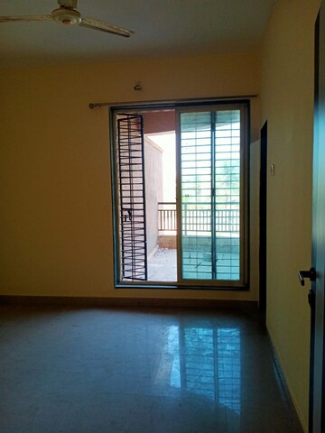 Room in 1 BHK Apartment at Mohan Suburbia, Ambernath West – for Rent