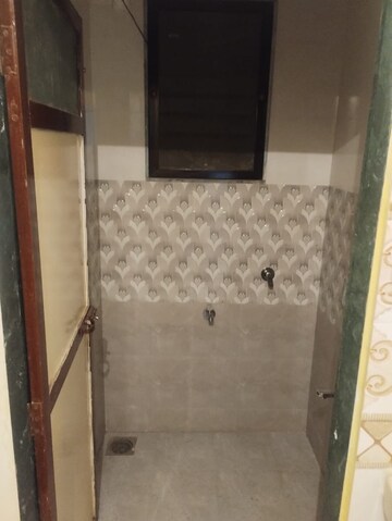 Bathroom in 1 BHK Apartment at Janki CHS, Borivali West – for Rent