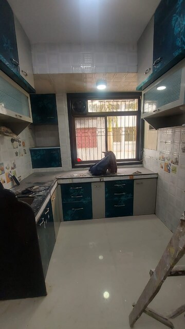 Kitchen in 2 BHK Apartment at OPG Tower, Sanpada – for Rent