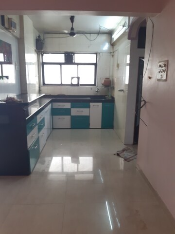 Kitchen in 2 BHK Apartment at Dream Shubhamkaroti CHS, Bhaskar Colony – for Rent