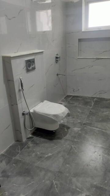 Bathroom in 3 BHK Apartment at Rohini Sector 9 – for Rent