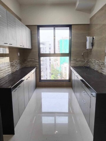 Kitchen in 2 BHK Apartment at Rajesh Raj Infinia, Malad West – for Rent