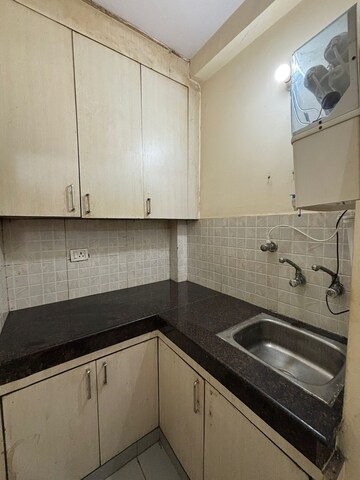 Kitchen in 1 RK Builder Floor at Ansal Sushant Lok I, Sector 43 – for Rent