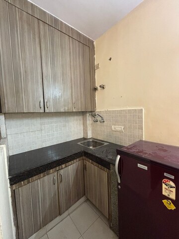 Kitchen in 1 RK Builder Floor at Ansal Sushant Lok I, Sector 43 – for Rent