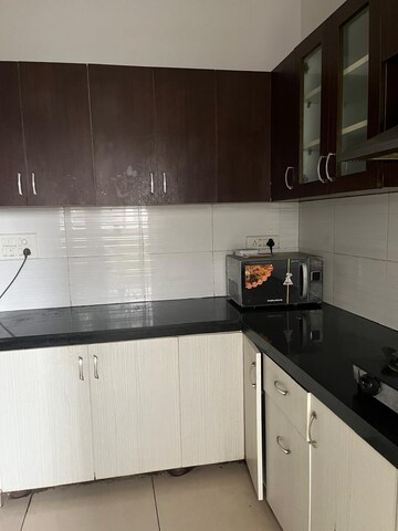 Kitchen in 3 BHK Apartment at Mahagun Mirabella, Sector 79 – for Sale