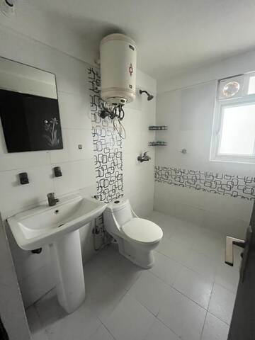 Bathroom in 3 BHK Apartment at Mahagun Mirabella, Sector 79 – for Sale